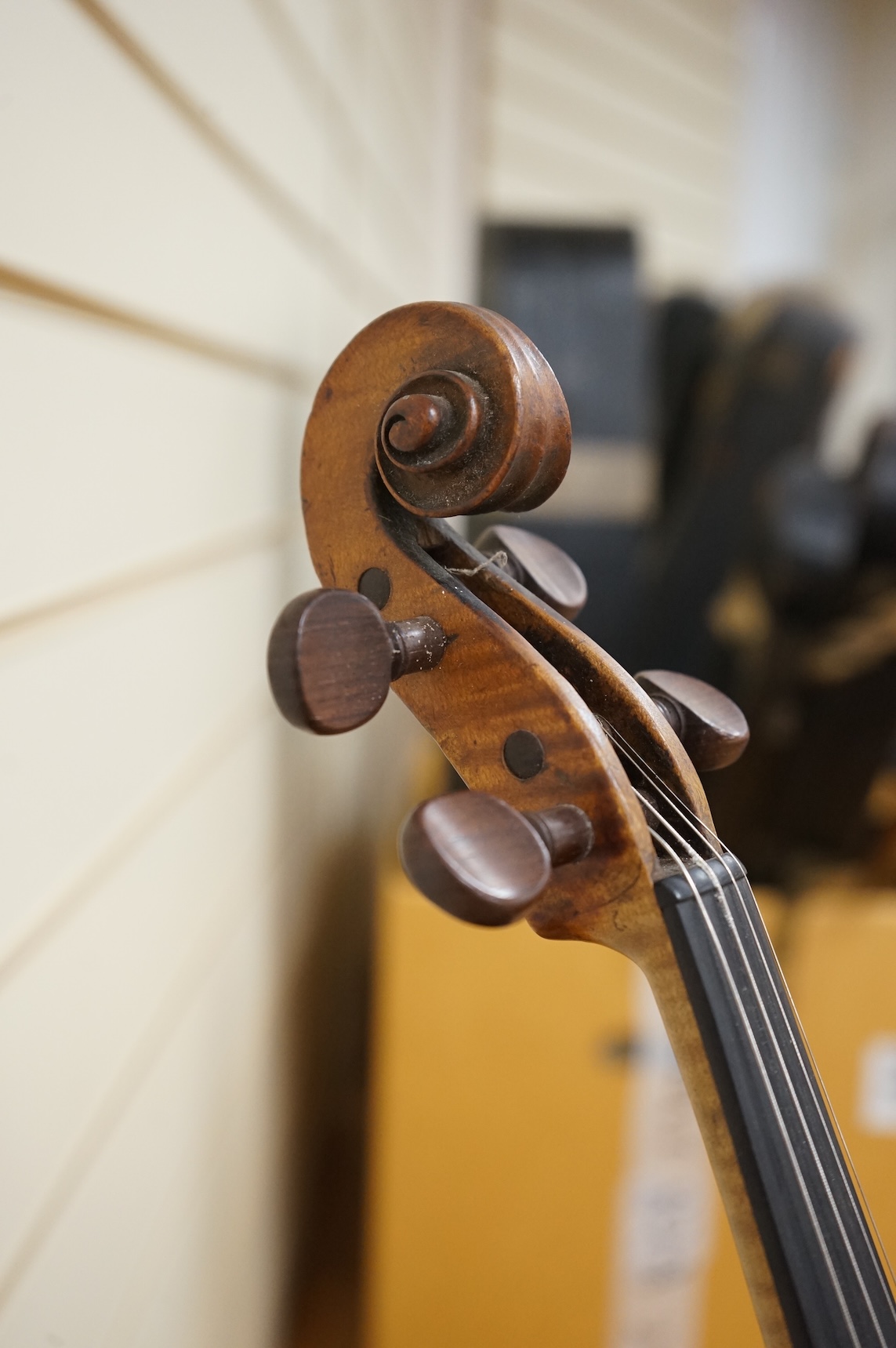 A late 18th century cased English violin, possibly after Richard Duke, length of body 35.5cm.